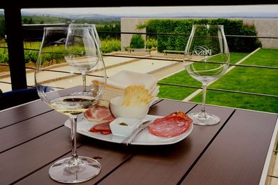 High angle view of wine glass on table at restaurant