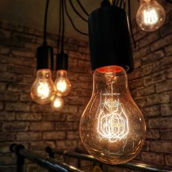 Close-up of illuminated light bulb