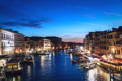 Boats moored at waterfront