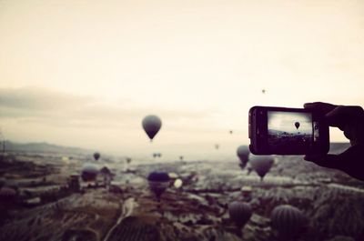 Photographer photographing through camera