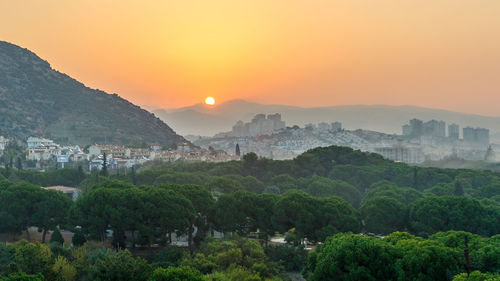 Scenic view of mountains against sky during sunset