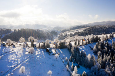 Panoramic view of snowcapped mountains against sky