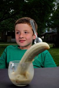 Portrait of boy holding ice cream