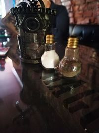 Close-up of bottles on table