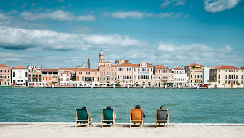 Buildings by sea against sky. venetian lagoon