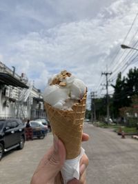 Woman holding ice cream cone