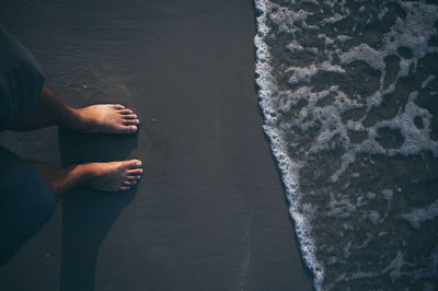 Low section of person on beach