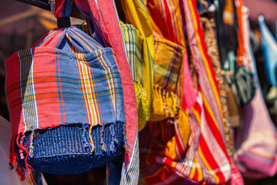 Close-up of clothes hanging in store for sale