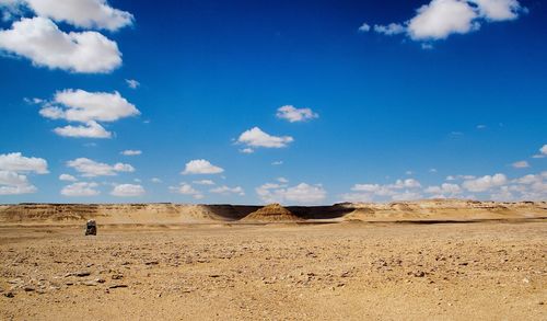 Scenic view of desert against sky