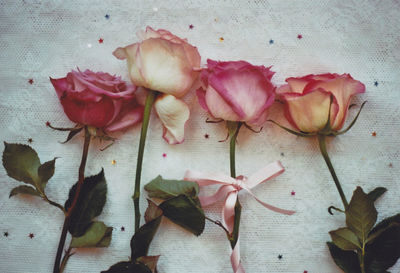Close-up of roses on table