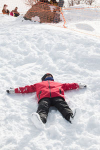 High angle view of person in snow on land