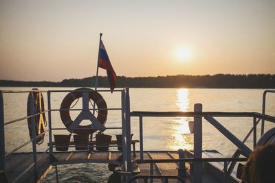 Scenic view of sea against clear sky during sunset