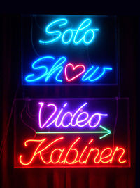 Close-up of illuminated neon text