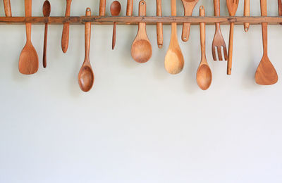 Close-up of clothes hanging over white background