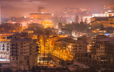 Illuminated cityscape at night