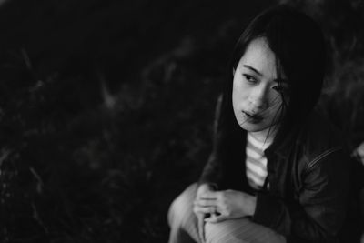 High angle view of thoughtful woman looking away