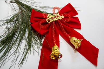 Close-up of christmas decorations over white background