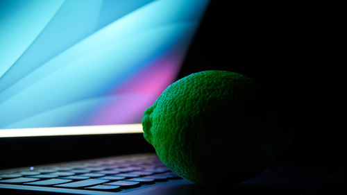 Close-up of multi colored ball on table