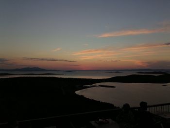 Scenic view of silhouette mountains against sky during sunset