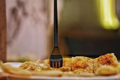 Close-up of food served on table