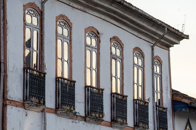 Low angle view of old building against sky