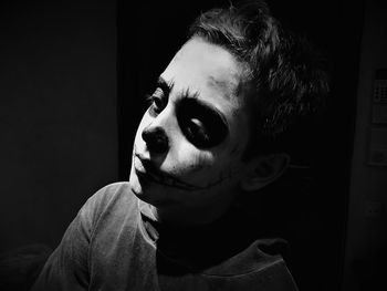 Close-up of boy with face paint