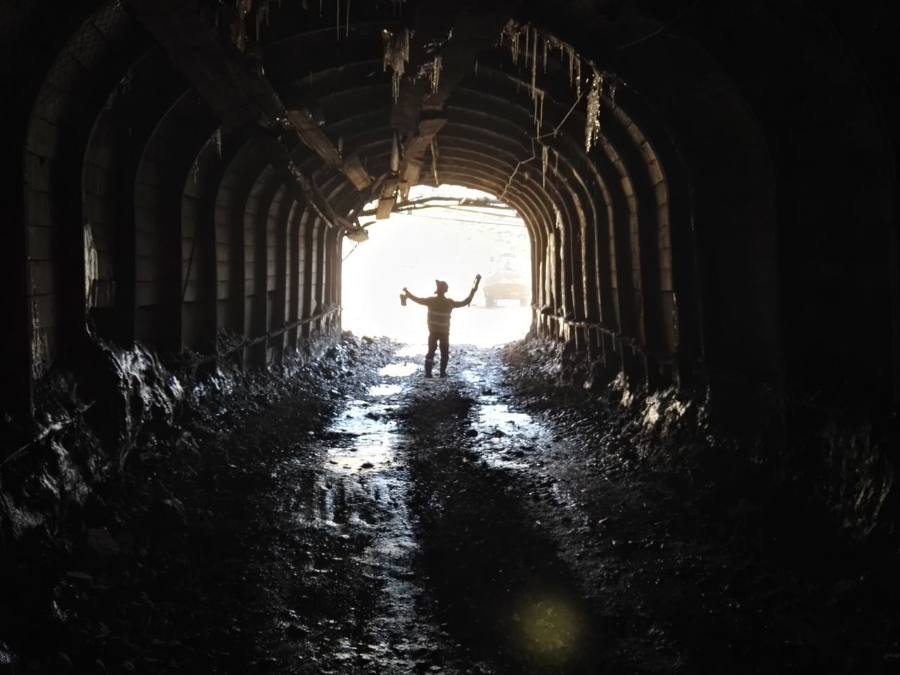 PERSON IN TUNNEL