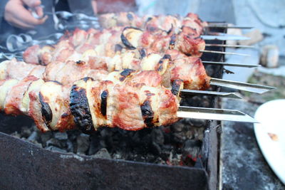 Close-up of meat on barbecue grill