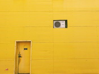 Close-up of yellow door