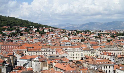 Aerial view of townscape against sky