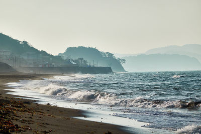 Scenic view of sea against clear sky