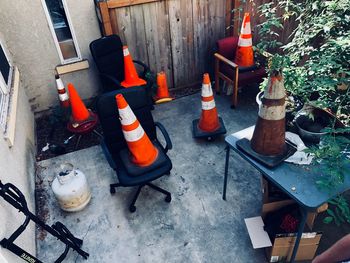 High angle view of bottles on table in yard