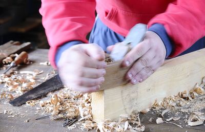 High angle view of man working on table