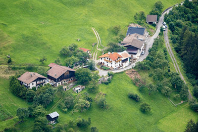 High angle view of houses and agricultural field