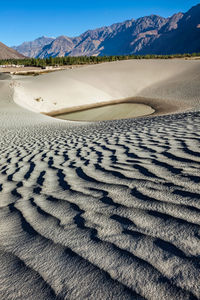 Scenic view of desert against sky