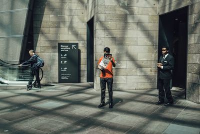 Men walking in city