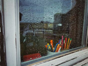 Wet glass window in rainy season