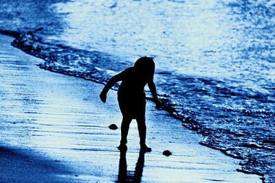 Woman standing in water