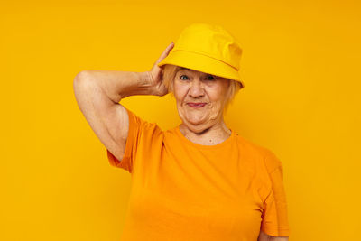 Portrait of senior woman wearing hat