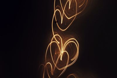 Light painting against black background