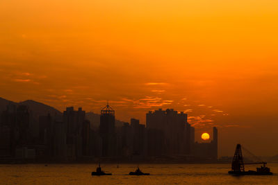 Silhouette of buildings at sunset