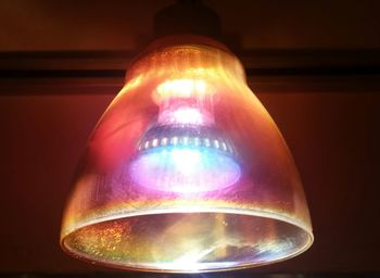 Low angle view of illuminated light bulb