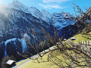 Scenic view of snowcapped mountains against sky