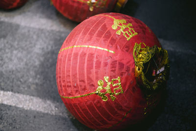 Close-up of red lantern on floor