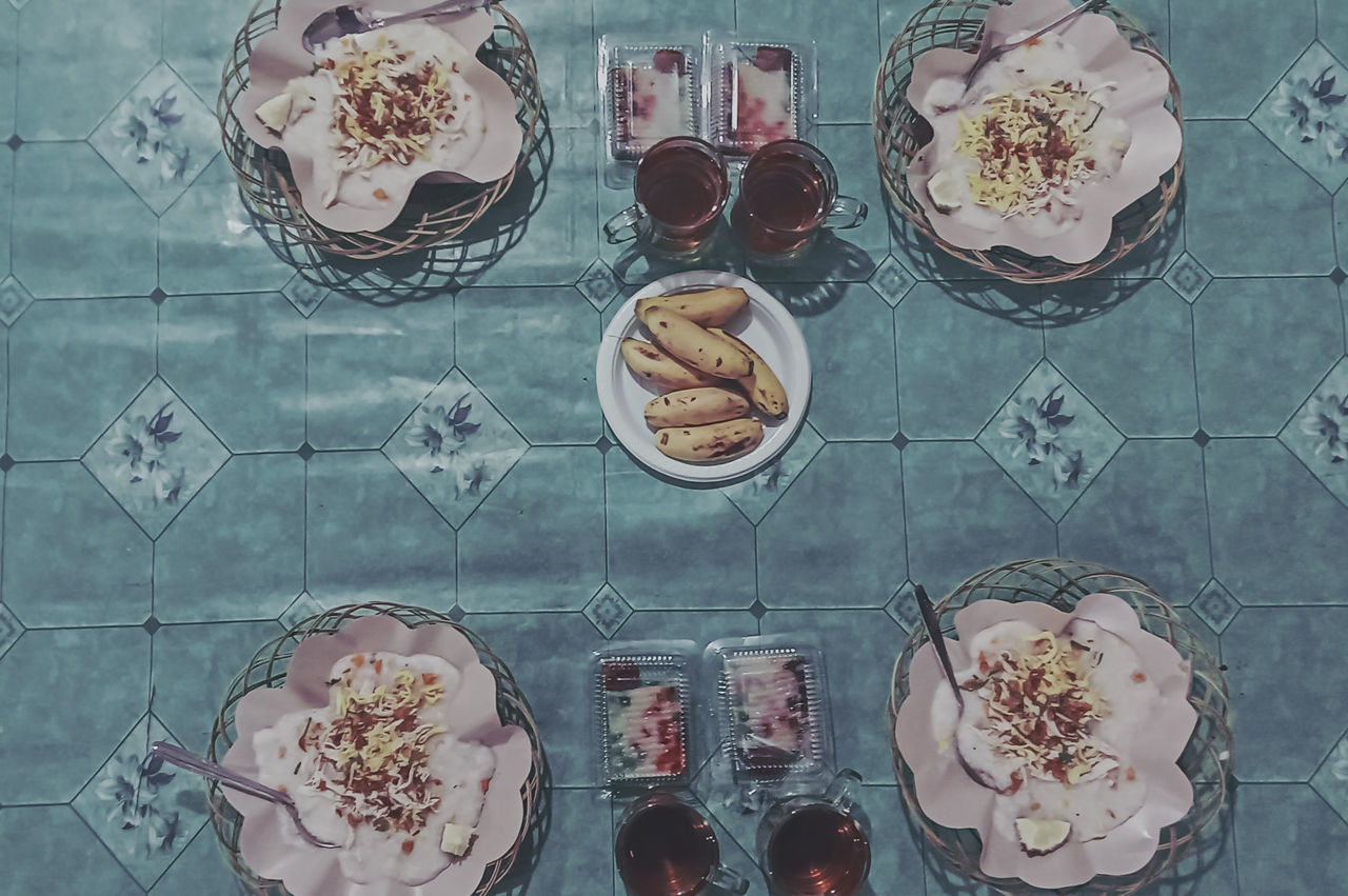 HIGH ANGLE VIEW OF DESSERT ON TABLE