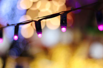 Close-up of illuminated light bulb