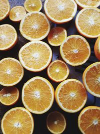 Full frame shot of oranges on table