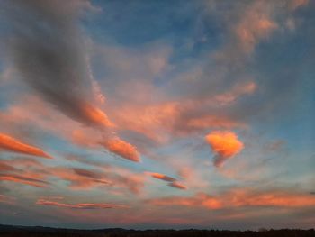 Low angle view of dramatic sky during sunset