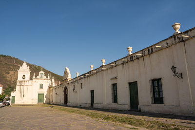 View of buildings against clear sky