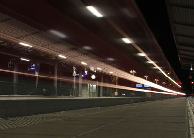 Railroad station platform at night